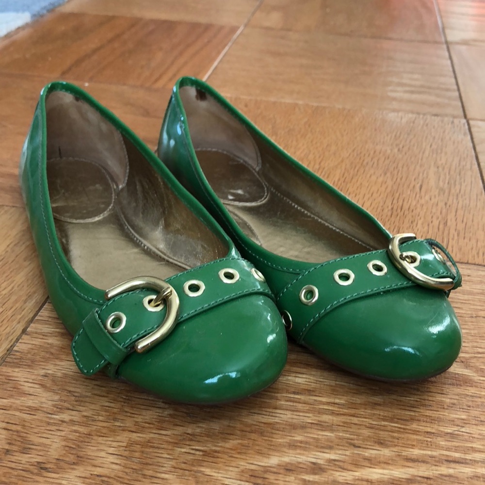Green Coach ballet flats with gold buckle